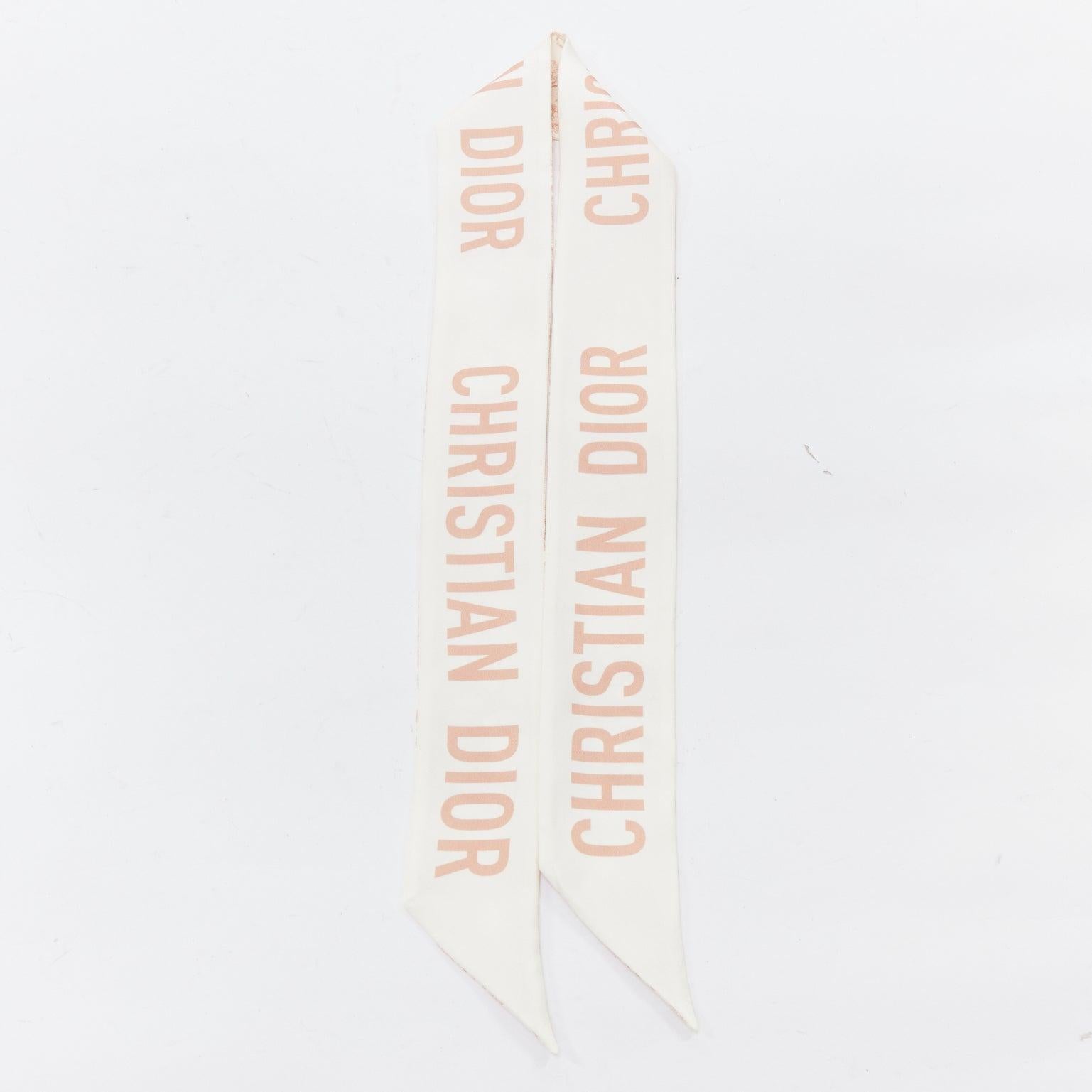 CHRISTIAN DIOR Toile De Jouy Sauvage Mitzah beige white print skinny scarf
Reference: KYCG/A00180
Brand: Dior
Model: Toile De Jouy Sauvage Mitzah
Color: Pink, Cream
Pattern: Floral
Extra Details: The Dior scarf is an instant classic and favorite of