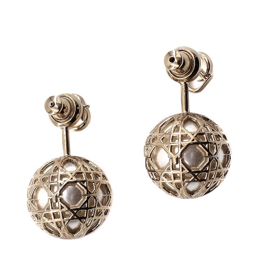 DIOR Tribales stud earrings. Each white resin pearl is covered with gilded with fine gold metal . 
In perfect condition.
Dimensions: 3x1.5 cm. 
Will be delivered in their dust bag and original DIOR box