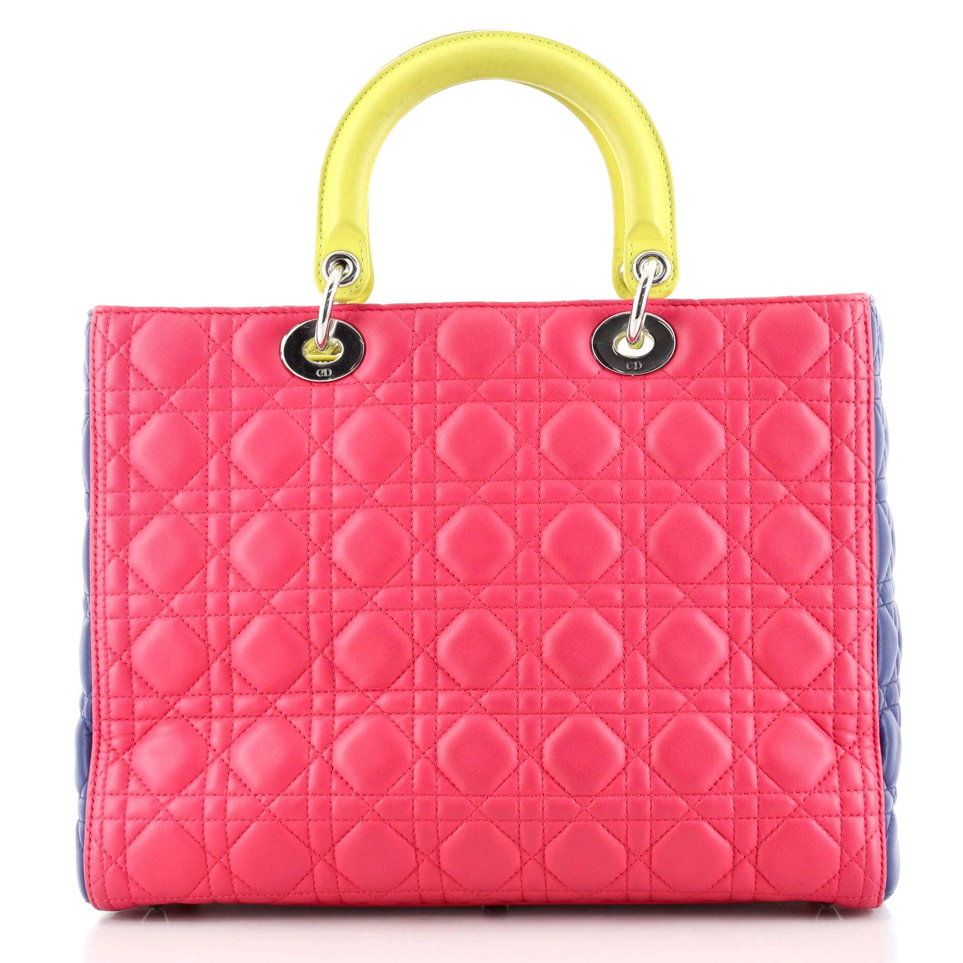 Christian Dior Tricolor Cannage Quilted Lambskin Leather Large Lady Dior Bag

Condition Details: Odor in interior. Slight wear and scuffs on exterior, creasing on rear, moderate wear on base and opening corners. Darkening and wear on handles, strap