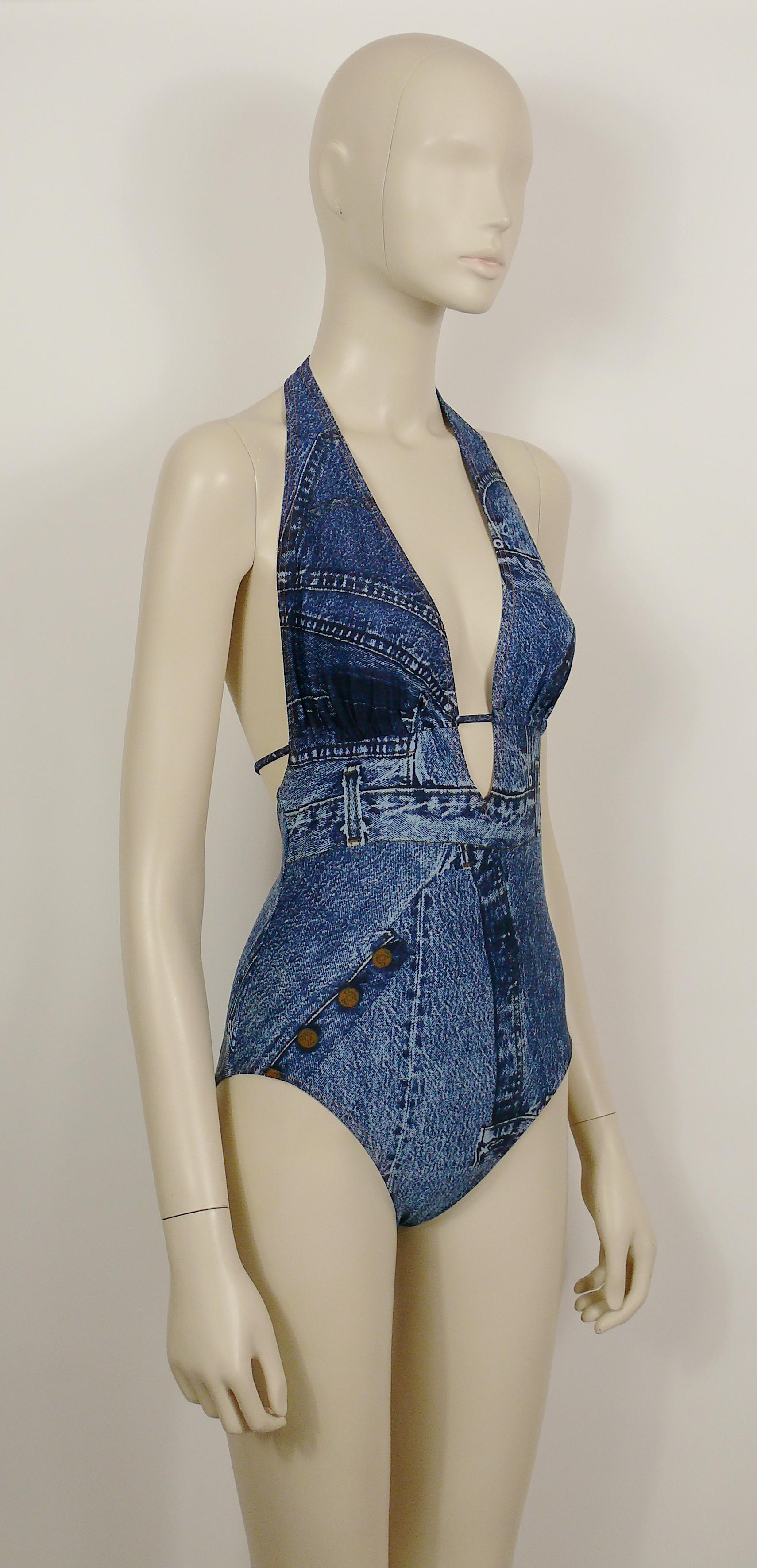 CHRISTIAN DIOR vintage one-piece halter swimsuit featuring a denim trompe l'oeil print.

Adjustable ties at back spaghetti straps.

Label reads CHRISTIAN DIOR.
Made in France.

Size tag reads : FR 42 / EUR 40 / INT 14.
Please refer to measurements.