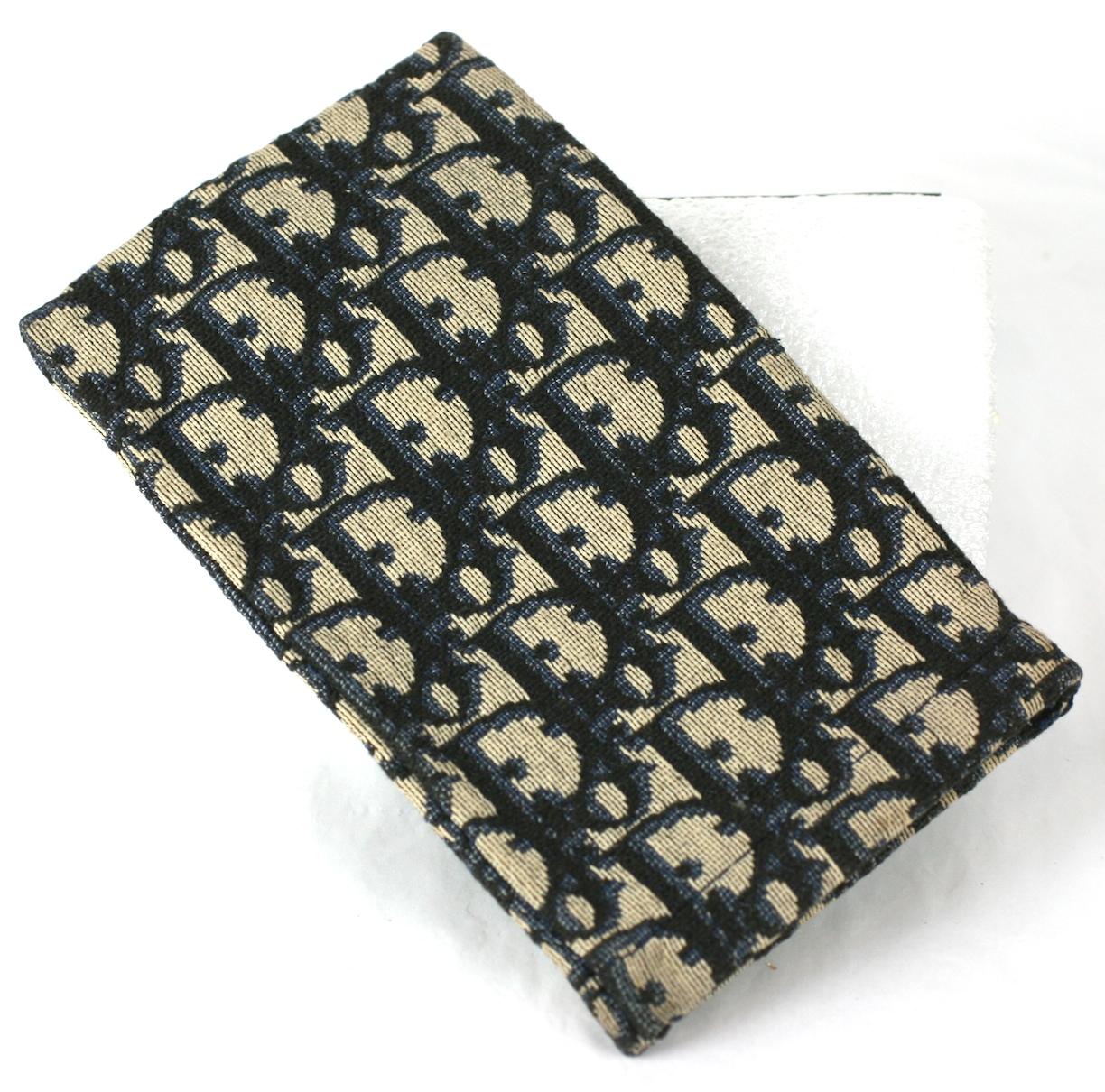 Vintage Christian Dior textile eye glass case of woven grey beige and navy, signature Trotter logo print. 
1980's France.  Excellent Condition. 
Length 6.50