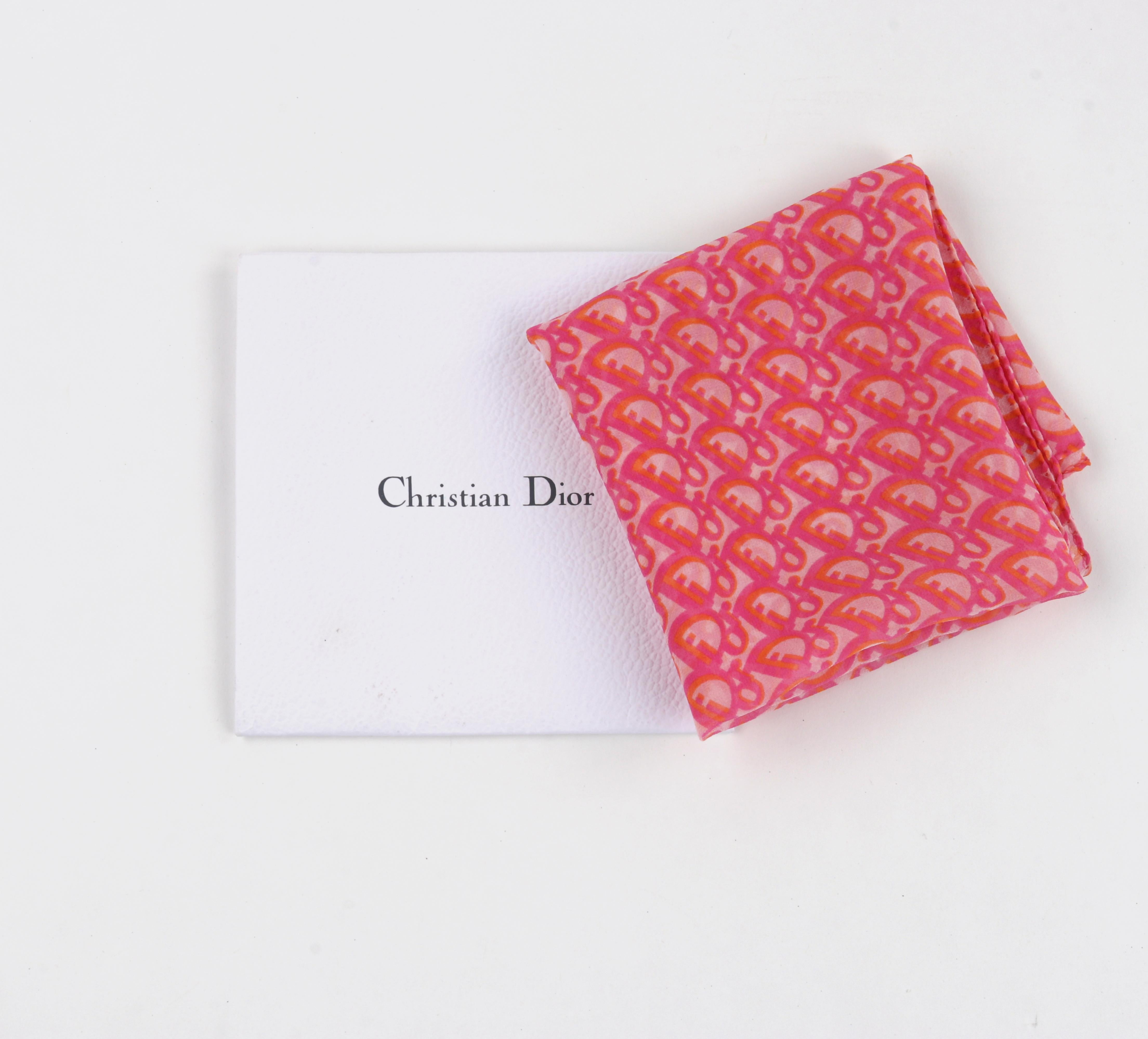 CHRISTIAN DIOR “Trotter” Pink & Orange Diorissimo Silk Chiffon Scarf w/ Envelope
 
Brand/Manufacturer: Christian Dior
Style: Square scarf
Color(s): “Rose”; Shades of pink, orange
Lined: No
Marked Fabric Content: “100% Silk”
Additional Details /