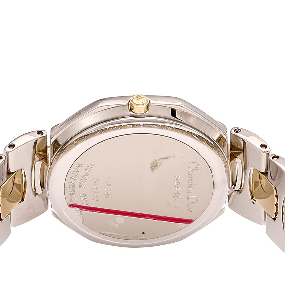 This watch by Dior is an elegant piece to complement your subtle, sophisticated looks. Rendered in two-tone stainless steel, the watch has a smooth octagonal bezel with a grey dial featuring dot-hour markers, two hands, a date window at six, and