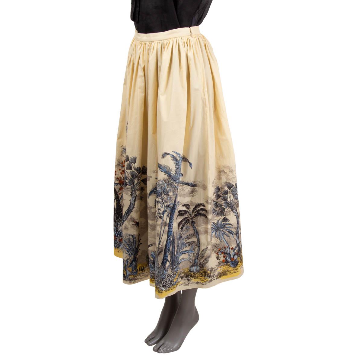 100% authentic Christian Dior 2019 Toile de Jouy Tropicalia flared midi skirt in pale vanilla with details in blue, black, white, rust and mustard. Opens with a zipper on the side and is unlined. Has been worn and is in excellent condition. 

2019