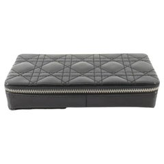Christian Dior vanity case features black Cannage quilted leather, silver-tone