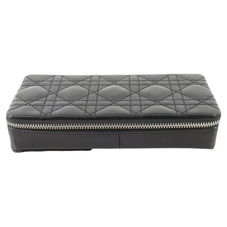 Christian Dior vanity case features black Cannage quilted leather