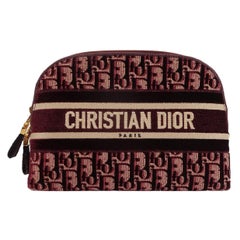 Christian Dior Astuccio cosmetico obliquo in velluto bordeaux