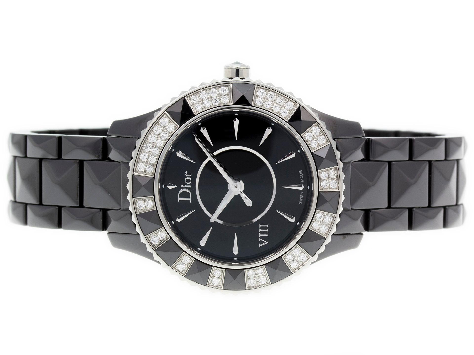 Brand:	Christian Dior	
Movement:	Swiss Quartz Battery
Series:	Dior VIII	
Functions:	Hour, Minute, Second
Model #:	CD1231E1C001	
Gender:	Ladies'
Condition:	Excellent Display Model, Faint Scratches on Case	
Dial Markers:	Black Dial w/ Steel Stick