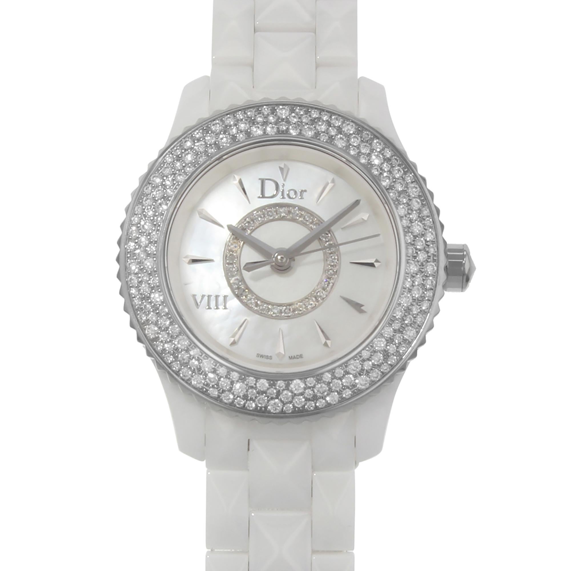 This display model Christian Dior VIII CD1221E4C001  is a beautiful Ladie's timepiece that is powered by quartz (battery) movement which is cased in a ceramic case. It has a round shape face, diamonds dial and has hand sticks style markers. It is