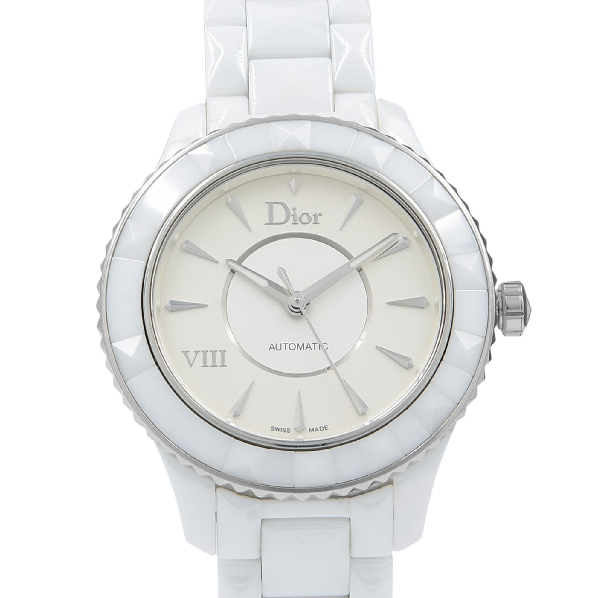 This pre-owned Christian Dior VIII CD1245E3C001 is a beautiful Ladies timepiece that is powered by an automatic movement which is cased in a ceramic case. It has a round shape face, no features dial and has hand sticks style markers. It is completed