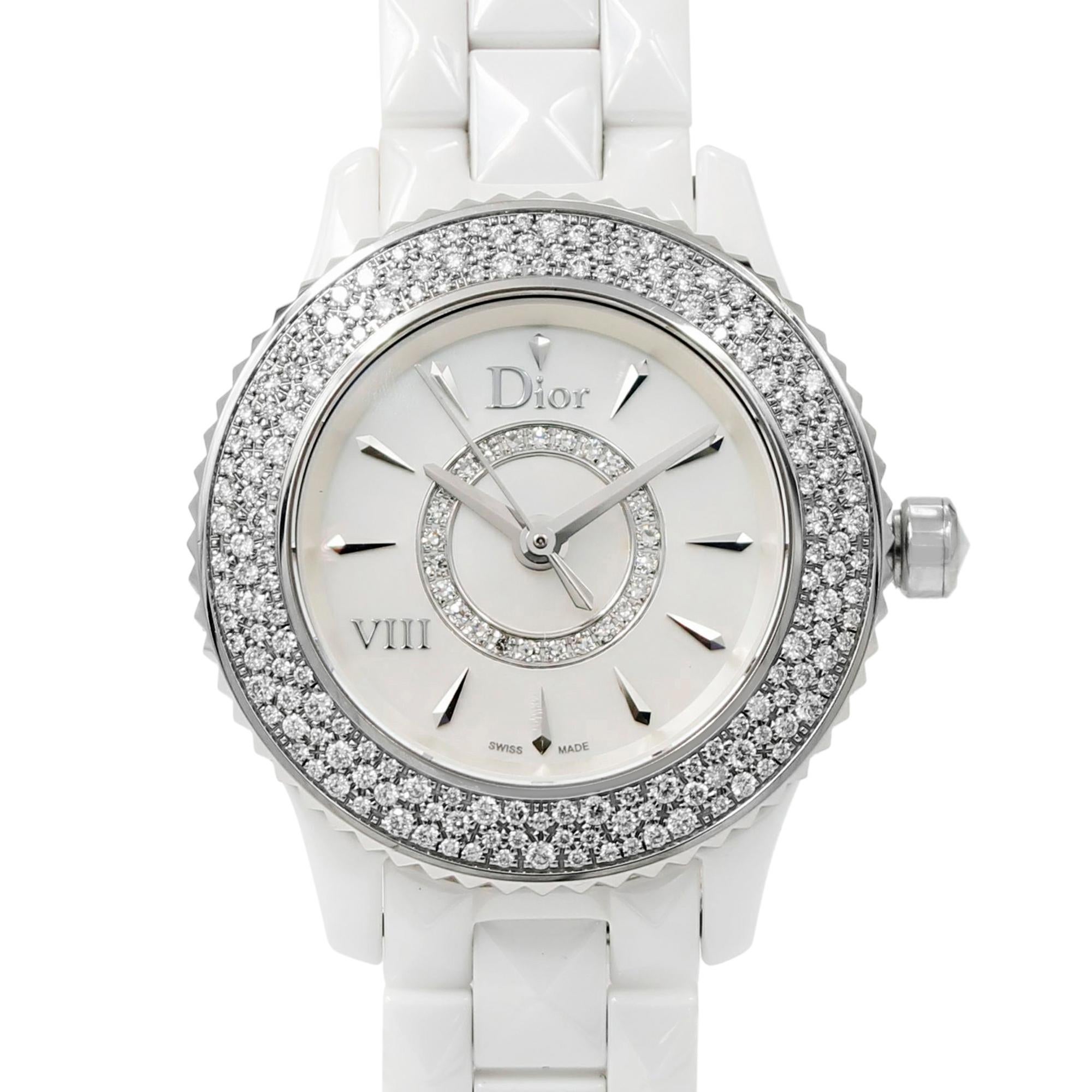 This New With Defects Christian Dior VIII CD1221E4C001 is a beautiful Ladies timepiece that is powered by a quartz movement which is cased in a ceramic case. It has a round shape face, diamonds dial and has hand sticks style markers. It is completed
