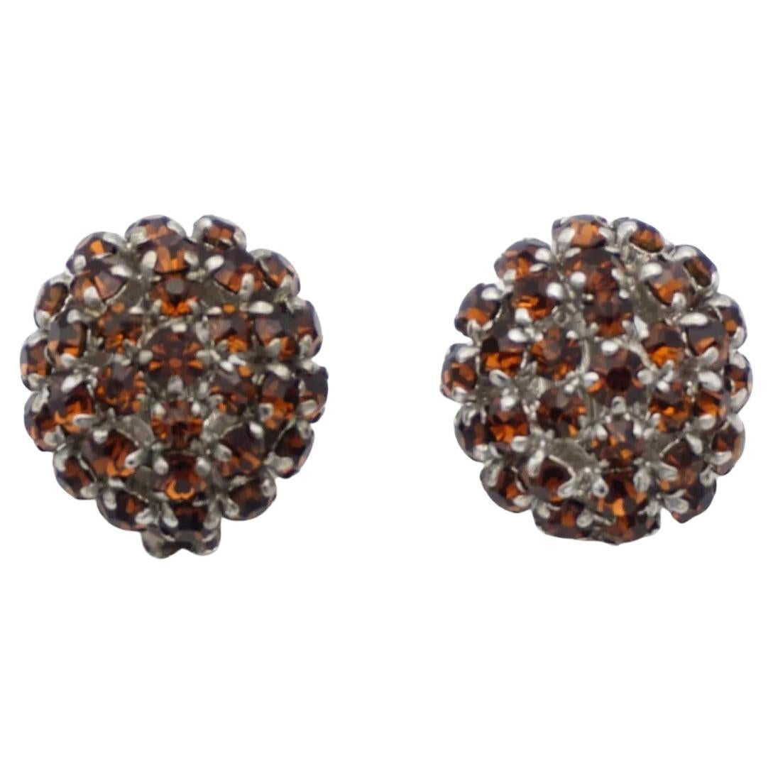 Christian Dior Vintage 1960 Citrine Amber Whole Crystals Circle Dome Earrings, Silver Tone

Very excellent condition. Light scratches or colour loss, barely noticeable. 100% Genuine.

Vintage and rare to find. A very beautiful pair of earrings by