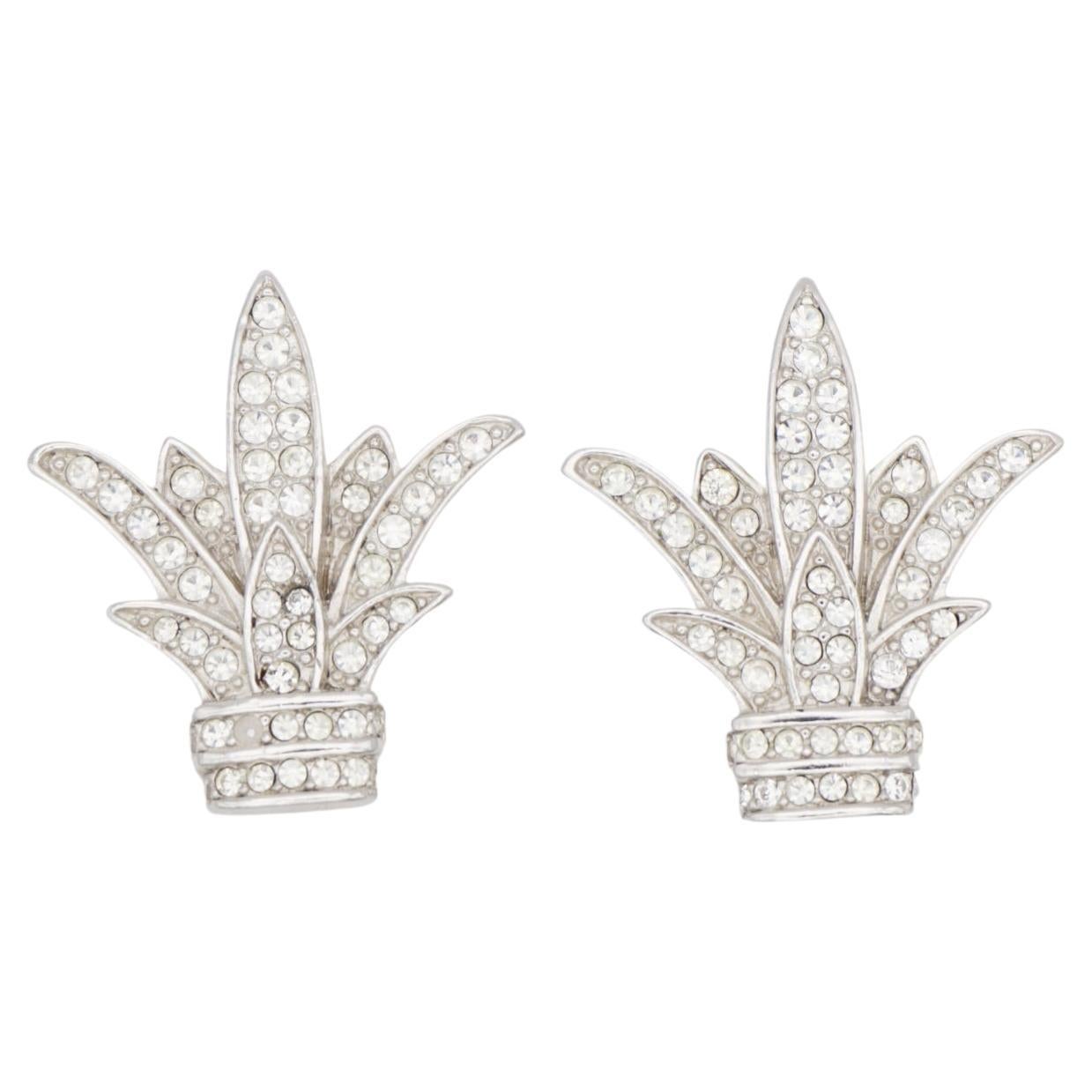 Christian Dior Vintage 1960s Fleur De Lis White Crystals Lily Flower Leaf Clip Earrings, Silver Tone

Very excellent condition. 100% genuine. Rare to find.

A very beautiful pair of clip on earrings by Chr. DIOR, signed at the back.

Size: 3.1*2.8