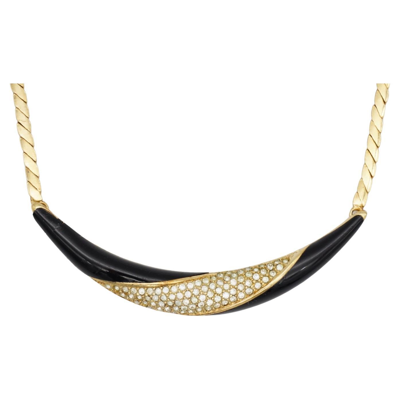 Christian Dior Vintage 1970s Unisex Black Crystals Crescent Moon Long Pendant Necklace, Gold Plated

Very good condition. Marked 'Chr.Dior (C) '. 100% Genuine.

Some very light scratches, pendant on the left was light split, but has been repaired,