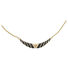 Christian Dior Vintage 1970 Collier long barre torsadée en émail noir et cristaux d'or