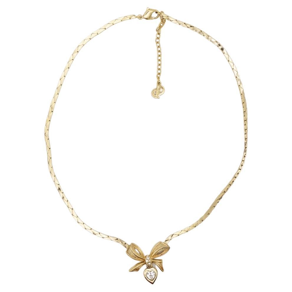 Christian Dior Vintage 1970er Jahre Knotenschleife Kristalle Herz Gold Tropfen-Anhänger Halskette im Angebot