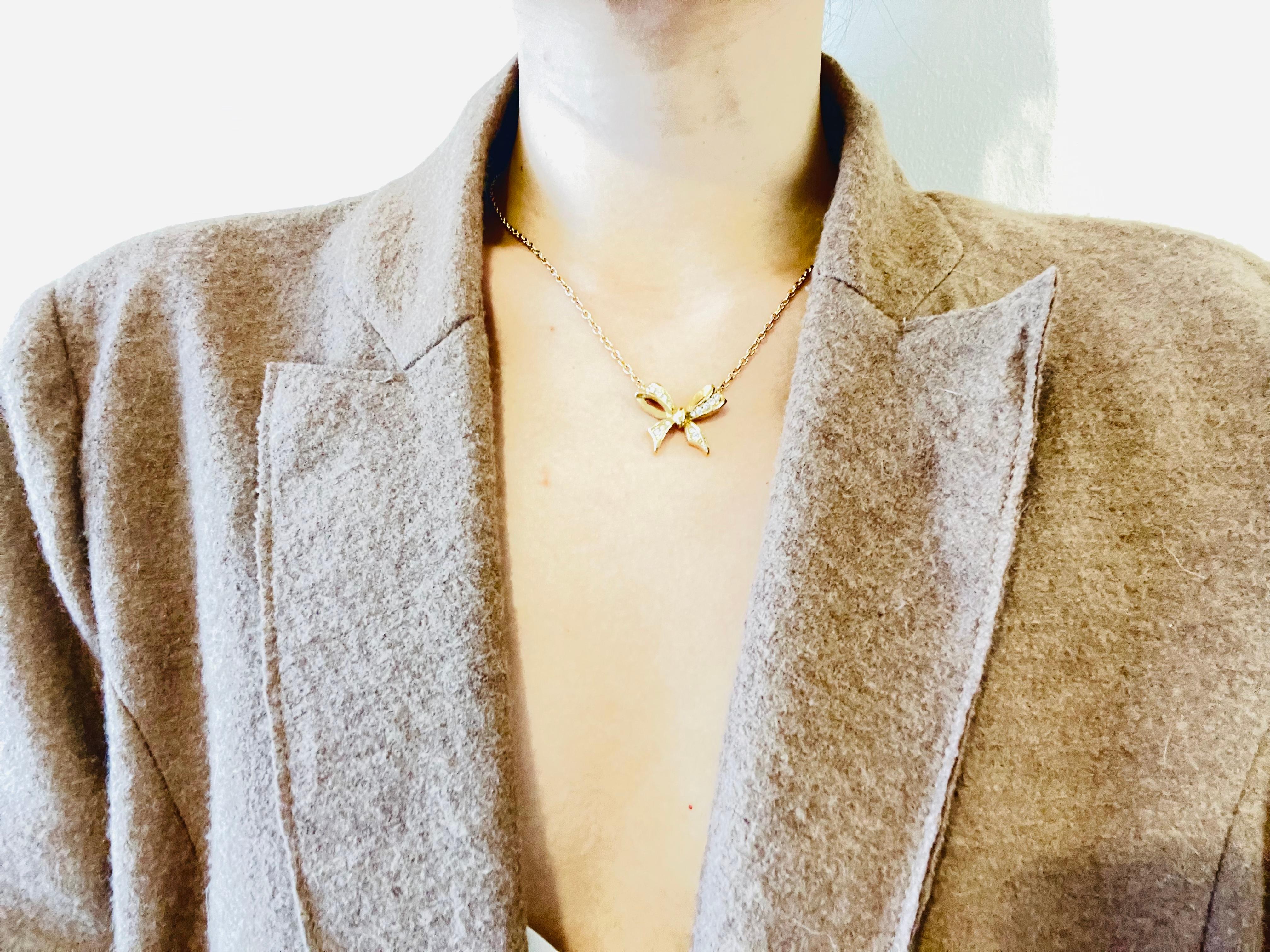 christian dior bow necklace gold