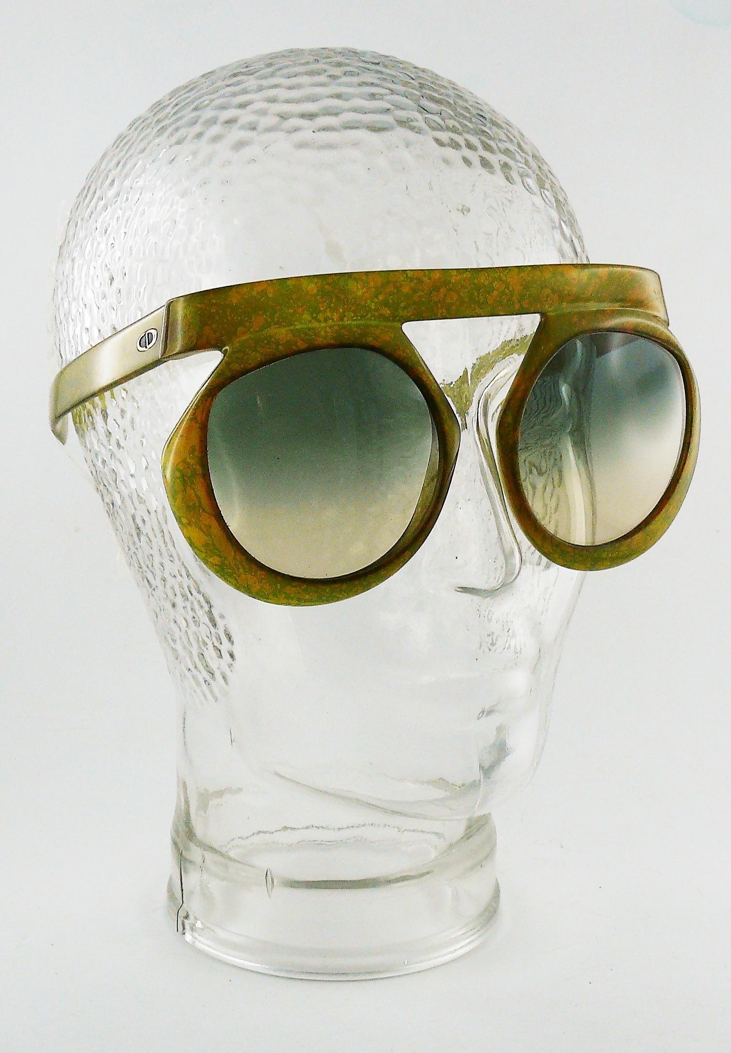 CHRISTIAN DIOR vintage 1970s rare dramatic oversized space age sunglasses featuring marbled design frame, metal CD logo on the sides and gradient plastic lenses.

As seen on LADY GAGA.

Signed CHRISTIAN DIOR OPTYL.
Made in Germany