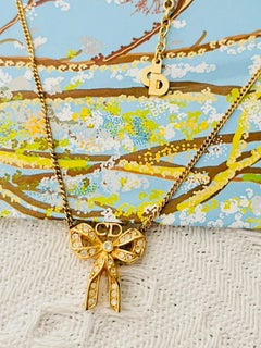 Christian Dior Vintage 1980 Logo CD Crystals Knot Bow Ribbon Butterfly Necklace
