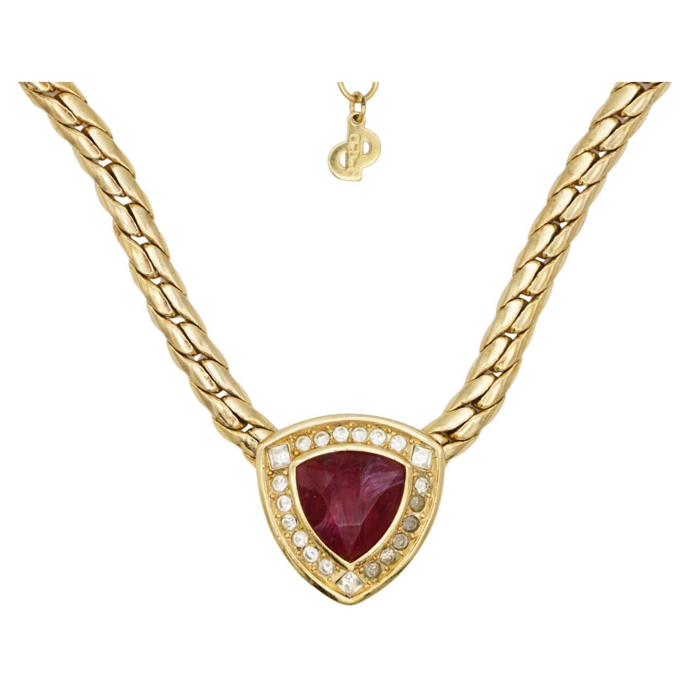 Christian Dior Vintage 1980s Ruby Red Cube Circle Crystals Triangle Pendant Elegant Modernist Necklace, Gold Plated

Very good condition. Light scratches or colour loss. 100% Genuine. 

Marked 'Chr.Dior (C) '. Rare to find.

Material: Gold plated