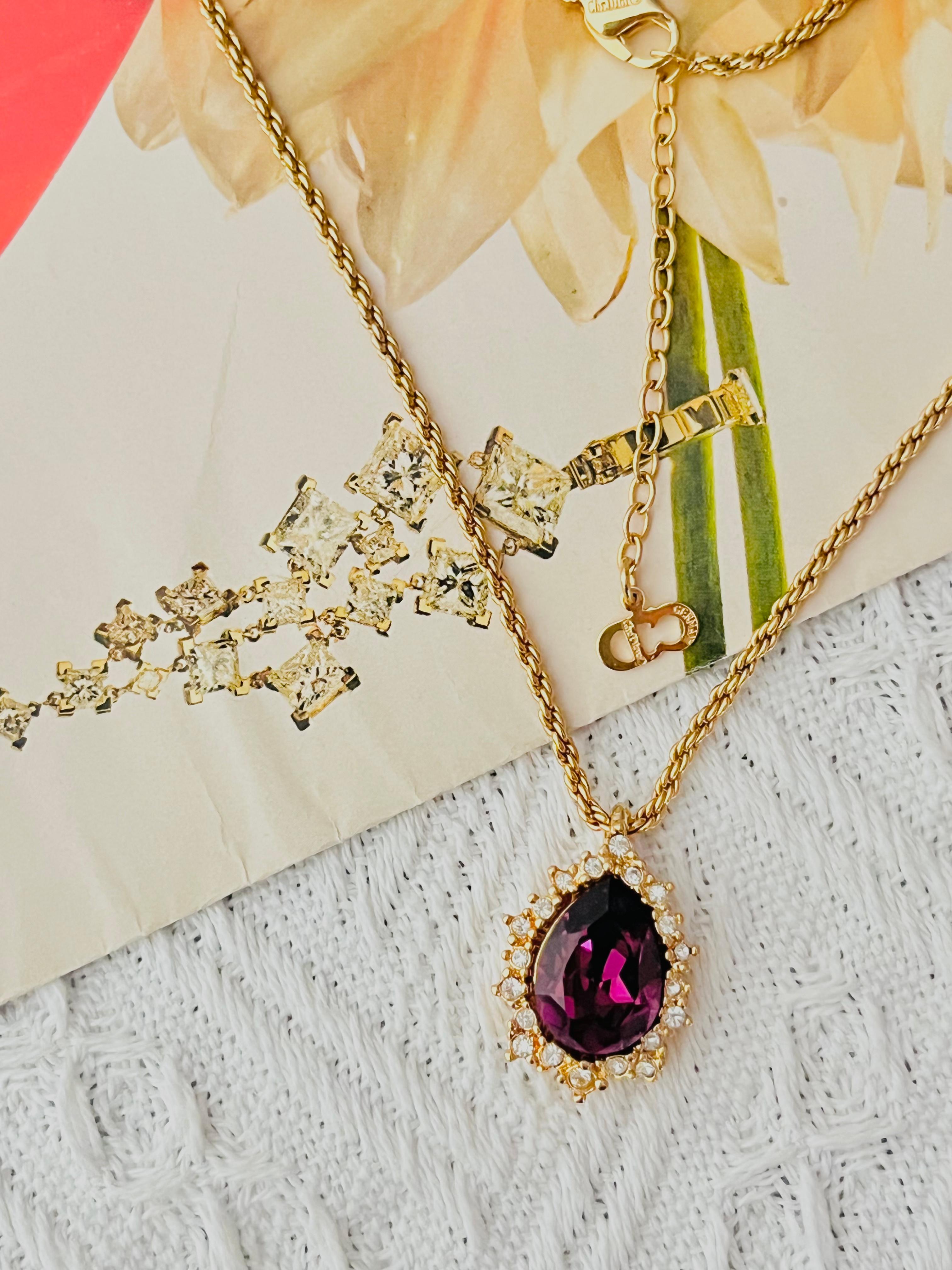 Christian Dior Vintage 1980s Unisex Amethyst Purple Shining Sparkling Sun Burst Crystals Water Tear Drop Pendant Elegant Modernist Necklace, Gold Plated

Very excellent condition. Not any stones lost. 100% Genuine.

Marked 'Chr.Dior (C)'. Very