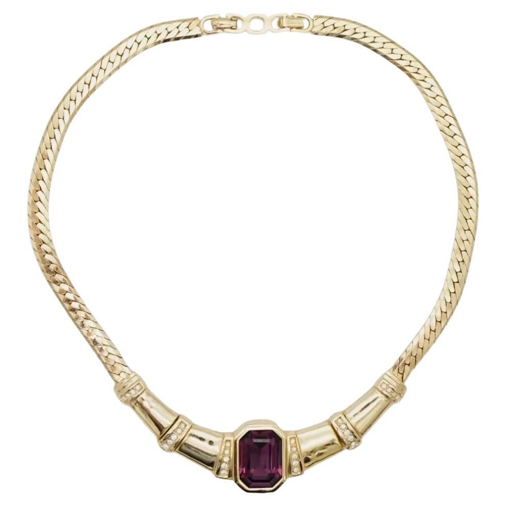 Christian Dior Vintage 1980s Unisex Amethyst Purple Rectangle Crystals Chunky Statement Necklace, Gold Plated

Very good condition. 100% Genuine.

Very beautiful. Marked 'Chr.Dior (C) '. Rare to find.

Materials: Gold Plated metal,