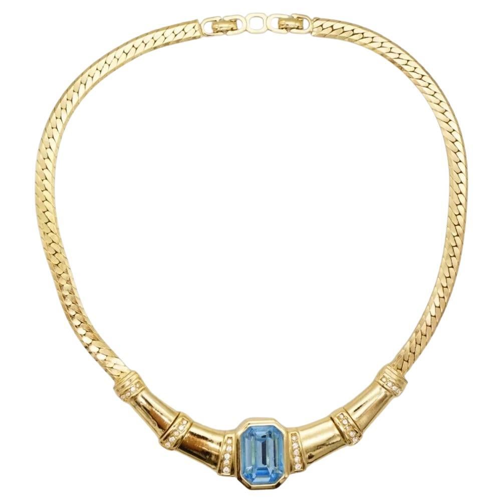 Christian Dior Vintage 1980s Unisex Aqua Blue Rectangle Crystals Chunky Statement Necklace, Gold Plated

Very good condition. 100% Genuine. 

Very beautiful. Marked 'Chr.Dior (C) '. Rare to find.

Materials: Gold Plated metal,