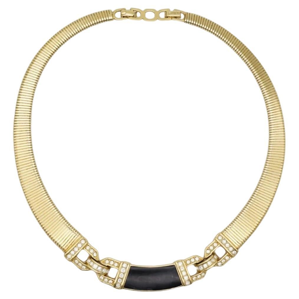 Christian Dior Vintage 1980s Unisex Schwarz Emaille Kristalle Interlocked Anhänger Omega Ribbed Choker Modernist Elegante Halskette, Gold-Ton

Sehr guter Zustand. 100% echt. Ein Unikat. Auf der Rückseite signiert. Selten zu finden.

MATERIAL: