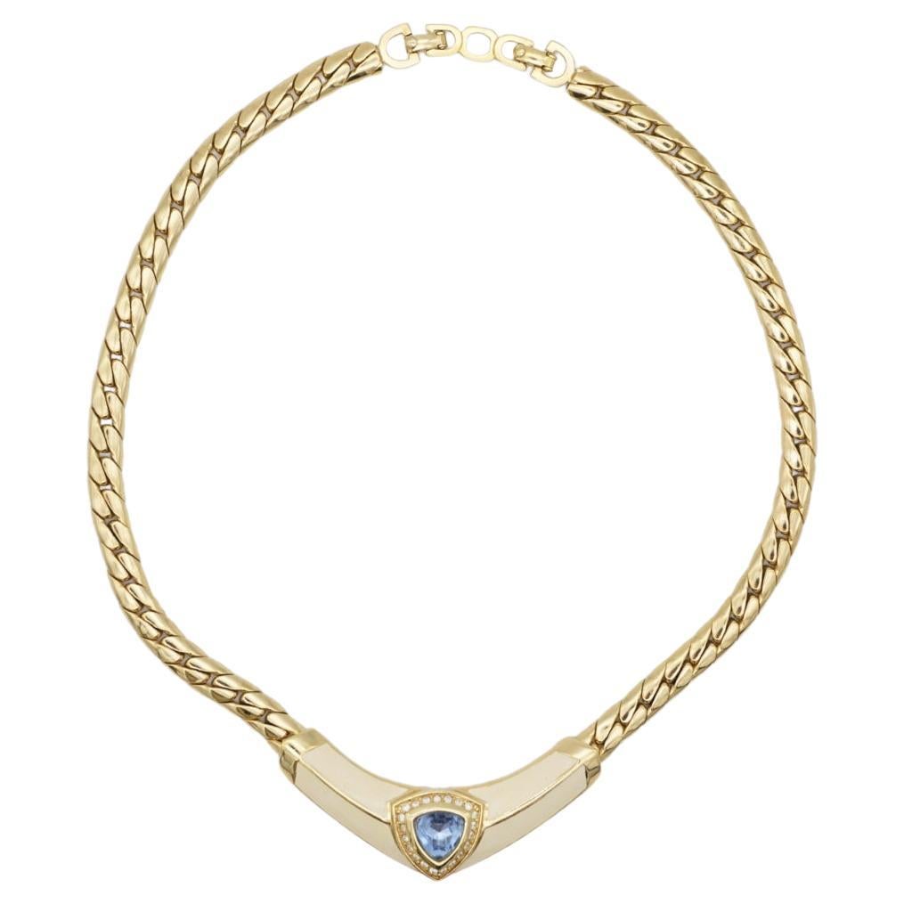 Christian Dior Vintage 1980s Aqua Blue Triangle Crystals Cream Necklace, Gold Plated

Very good condition. Some light scratches or colour loss, barely noticeable. 100% Genuine.

Marked 'Chr.Dior (C) '. Rare to find.

Materials: Gold Plated metal,