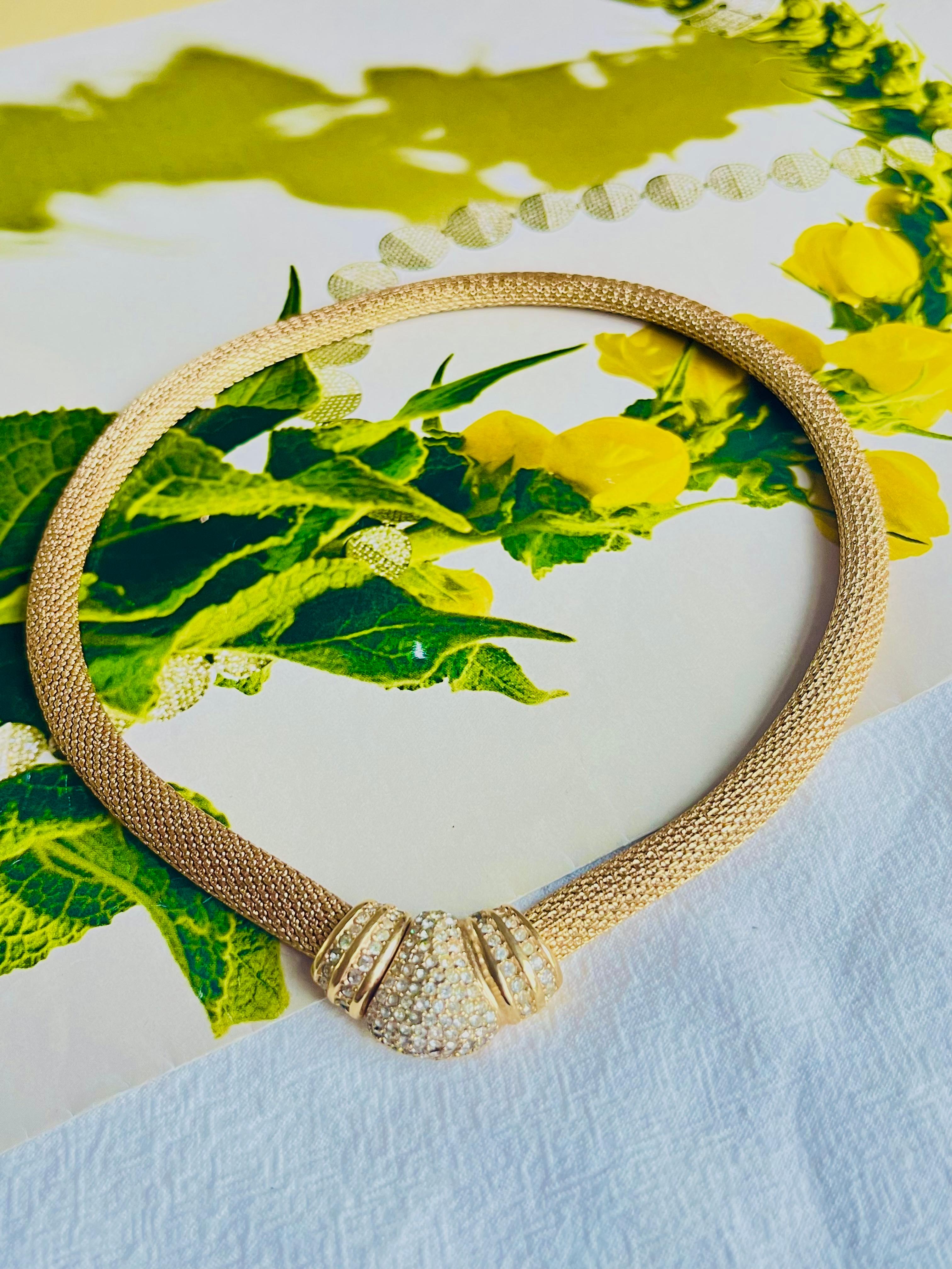 Christian Dior Vintage 1980s Button Whole Crystals Omega Snake Mesh Necklace, Gold Plated

Very good condition. Maybe some of colour loss and light scratches, barely noticeable. 

Marked 'Chr.Dior (C) '. 100% genuine.

It is over 40 years old. This