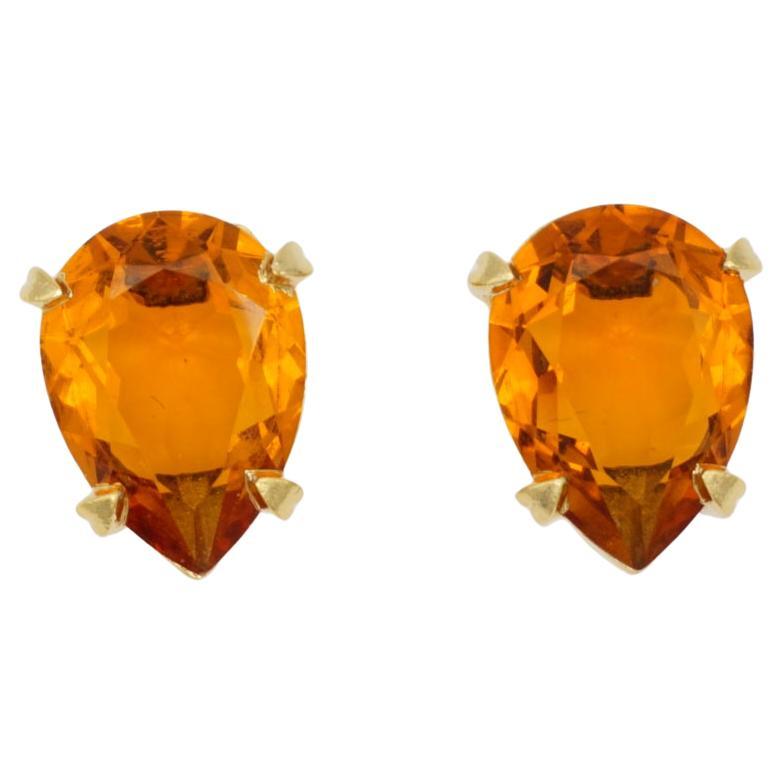 Christian Dior Vintage 1980s Citrine Orange Crystal Water Tear Drop Clip Earrings, Gold Tone

Very good condition. 100% Genuine. Rare to find.

A very beautiful pair of earrings by Chr. DIOR, signed at the back.

Material: Gold plated metal,
