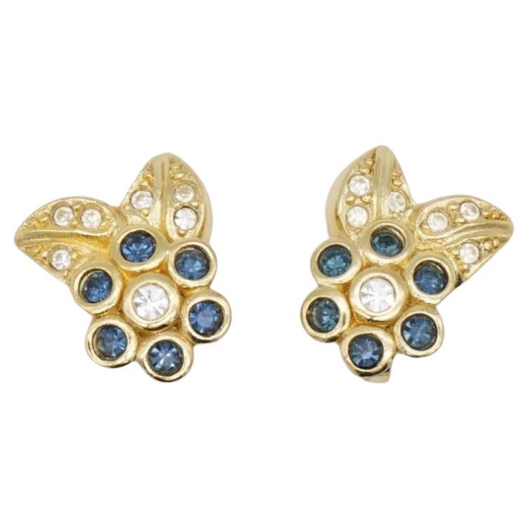 Christian Dior Vintage 1980s Cluster Sapphire Flower Leaf Crystal Clip Earrings, Gold Tone

Very excellent condition. 100% Genuine. Rare to find.

A very beautiful pair of earrings by Chr. DIOR, signed at the back.

Size: 1.5*1.3 cm.

Weight: 3.5