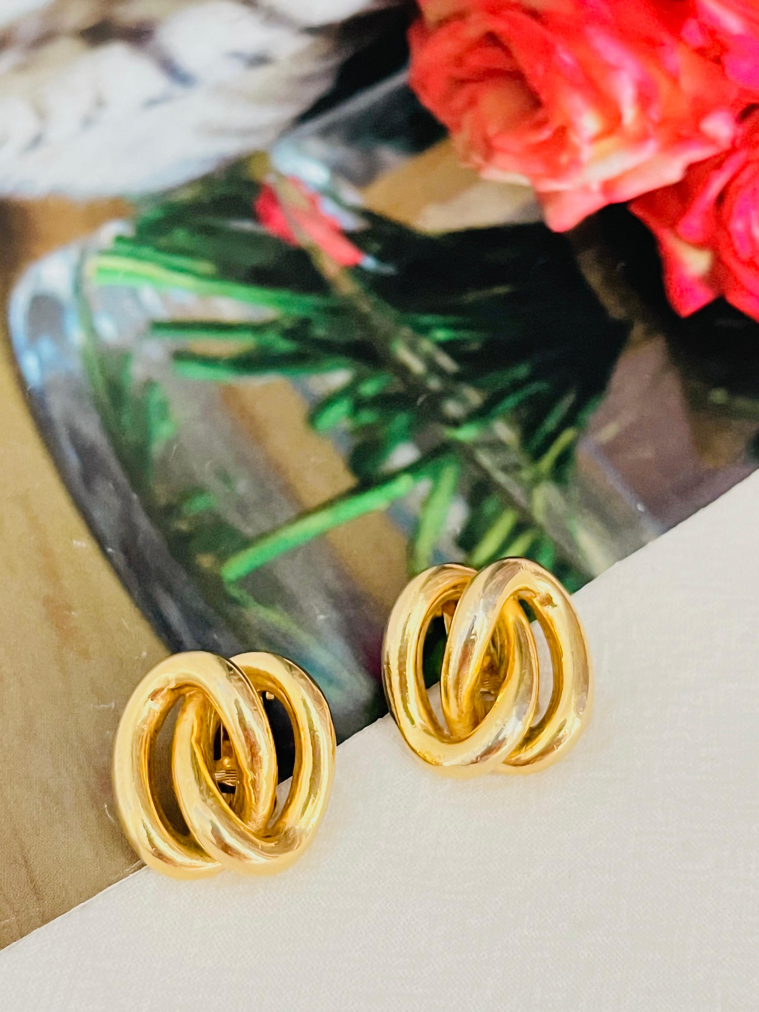 Femenino o masculino Christian Dior Vintage Años 80 Pendientes de clip de aro con doble nudo ovalado de cuerda entrelazada en venta