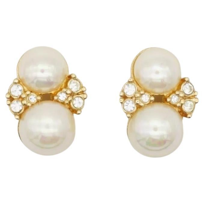 Christian Dior Vintage 1980s Double Round White Pearls Cluster Crystals Elegant Clip Earrings, Gold Tone

Excellent condition. Very new. 100% genuine. 

A very beautiful pair of clip on earrings by Chr. DIOR, signed at the back.

Size: 2.0*1.2