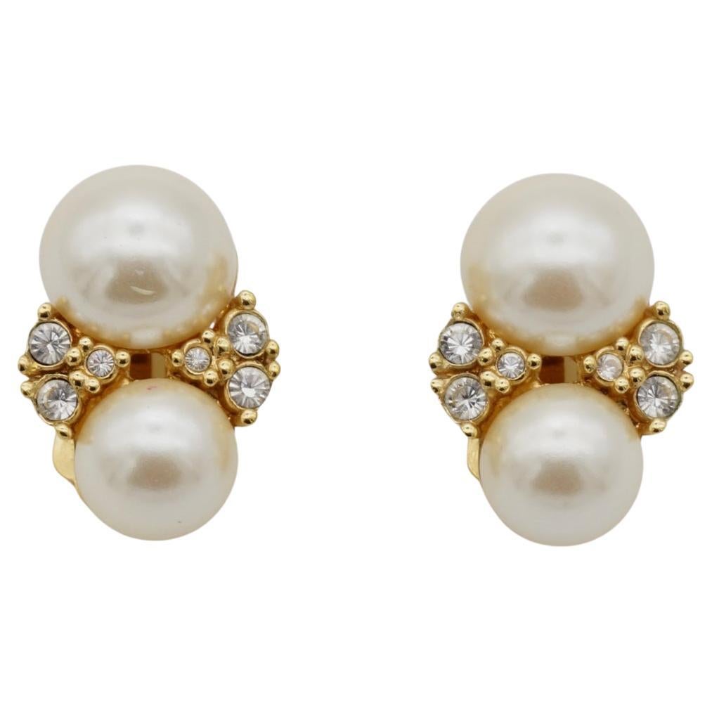 Christian Dior Vintage 1980s Double White Pearls Cluster Crystals Clip Earrings, Gold Tone

Very excellent condition. 100% genuine. 

A very beautiful pair of clip on earrings by Chr. DIOR, signed at the back.

Size: 2.0*1.2 cm.

Weight: 6.0