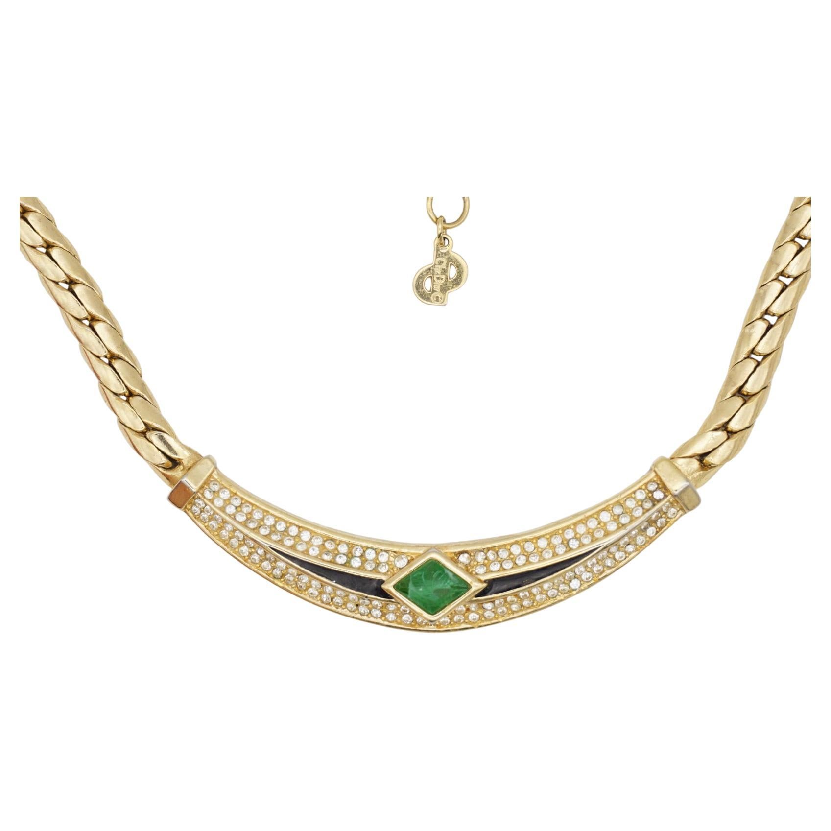 Christian Dior Vintage 1980s Emerald Green Gripoix Black Enamel Crystals Chunky Pendant Necklace, Gold Tone

Very good condition. Only colour loss at clasp. Some stones are shine off. 100% genuine.

A unique piece. Signed at the back. Very good