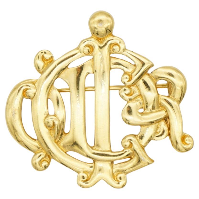 Christian Dior Vintage 1980s Glow Logo Monogram interlocked Letters Gold Brooch For Sale