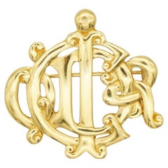 Christian Dior Vintage 1980s Glow Logo Monogram interlocked Letters Gold Brooch