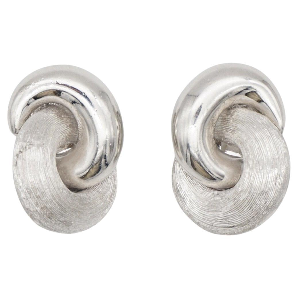 Christian Dior Vintage 1980s Glow Matte Interlocked Knot Silver Clip Earrings