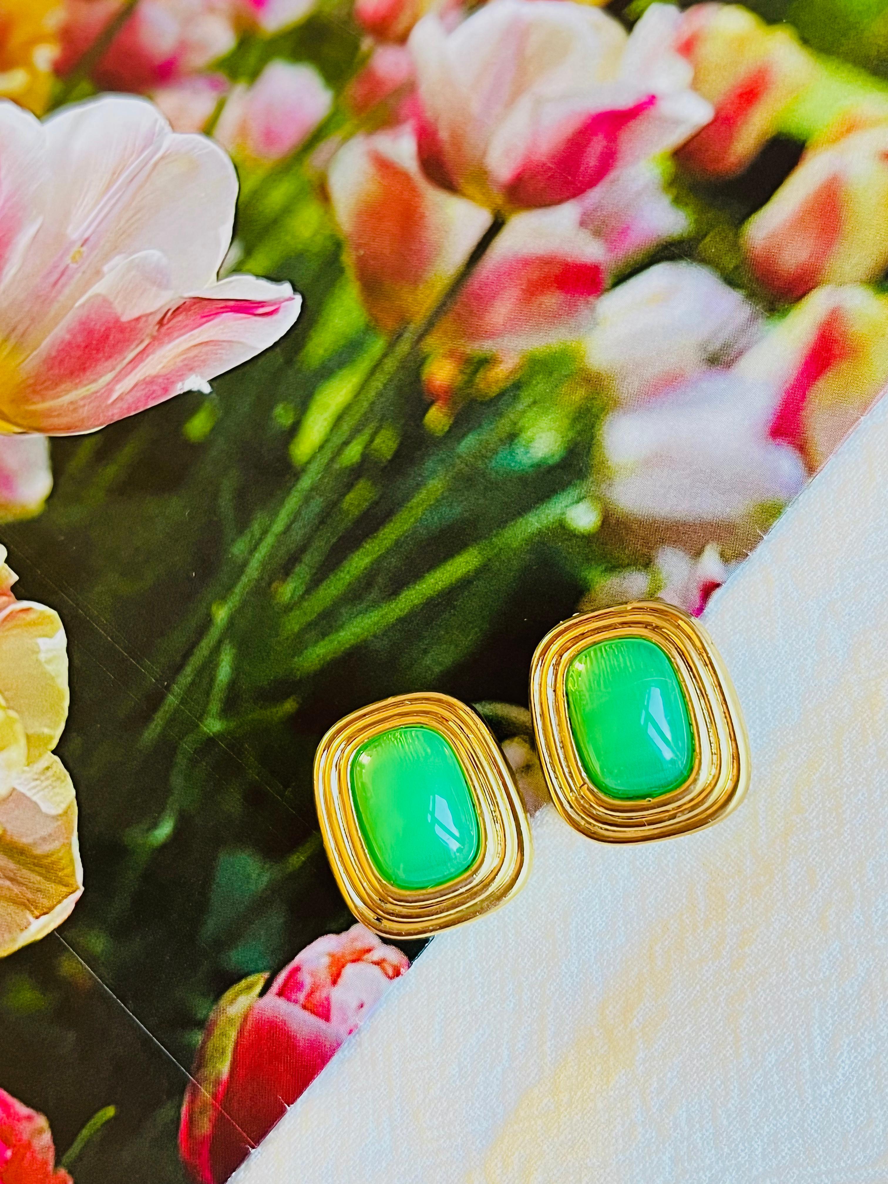 Very good condition. Vintage and rare to find. 100% Genuine.

Some light scratches and colour loss, barely noticeable. One clip leans a little bit. Still very good to use.

A very beautiful pair of clip on earrings by Chr. DIOR, signed at the