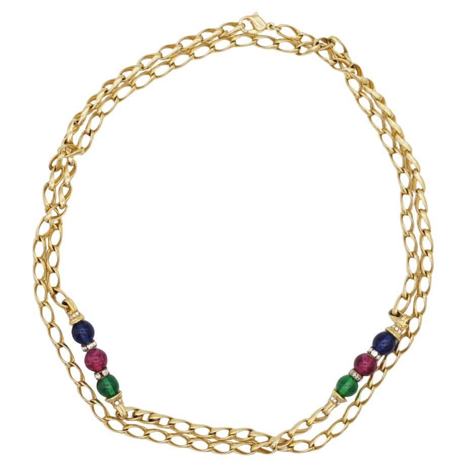 Christian Dior Vintage 1980s Gripoix Saphir Rubin Smaragd Blau Rot Grün Kugeln Charme Kandare verknüpft Kette Modenrist Elegant Lange Halskette, Gold-Ton

Vielseitige Halskette. Es kann auch als Armband getragen werden oder einen Anhänger an der
