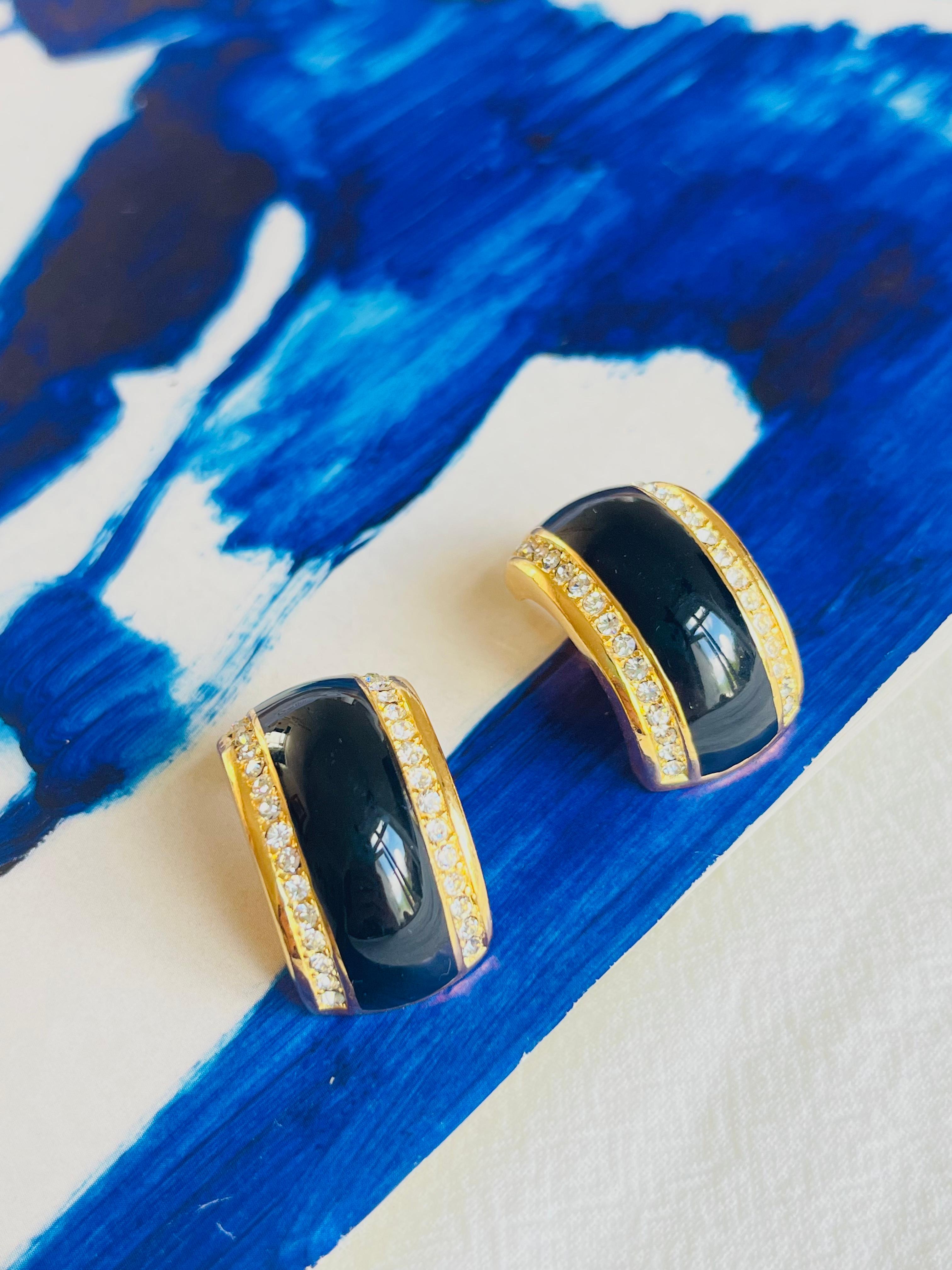 Christian Dior Vintage 1980s Large Black Enamel Double Crystals Dome Hoop Clip Earrings, Gold Tone

Very excellent condition. Very new. 100% genuine. 

A very beautiful pair of clip on earrings by Chr. DIOR, signed at the back.

Size: 2.8*1.8