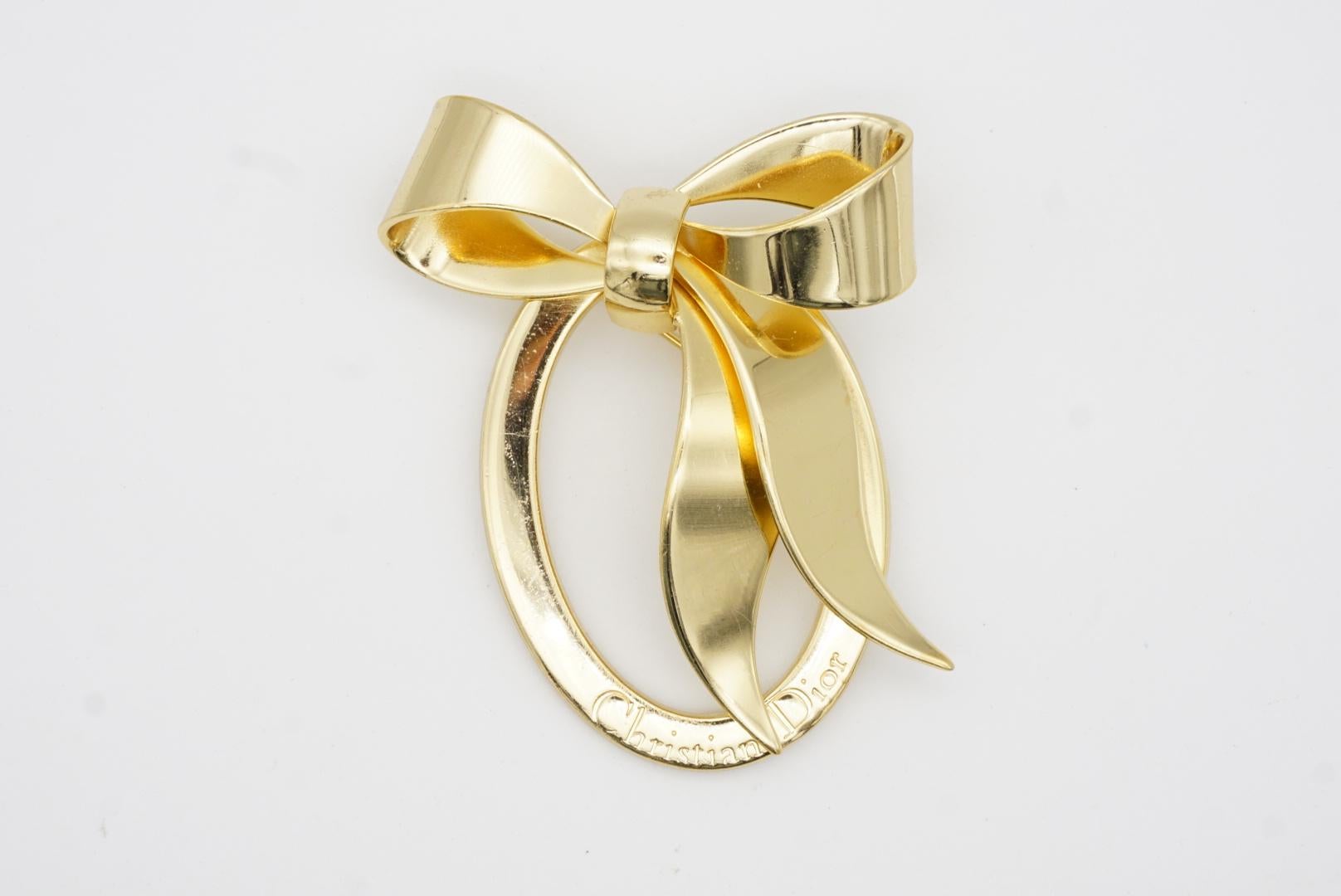 Christian Dior Vintage 1980s Large Glow Logo Monogram Bow Ribbon Gold Brooch For Sale 1