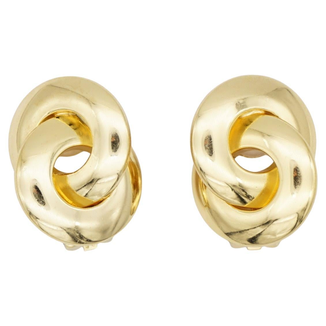 Christian Dior Vintage Años 80 Grandes Pendientes de clip entrelazados con nudo giratorio brillante