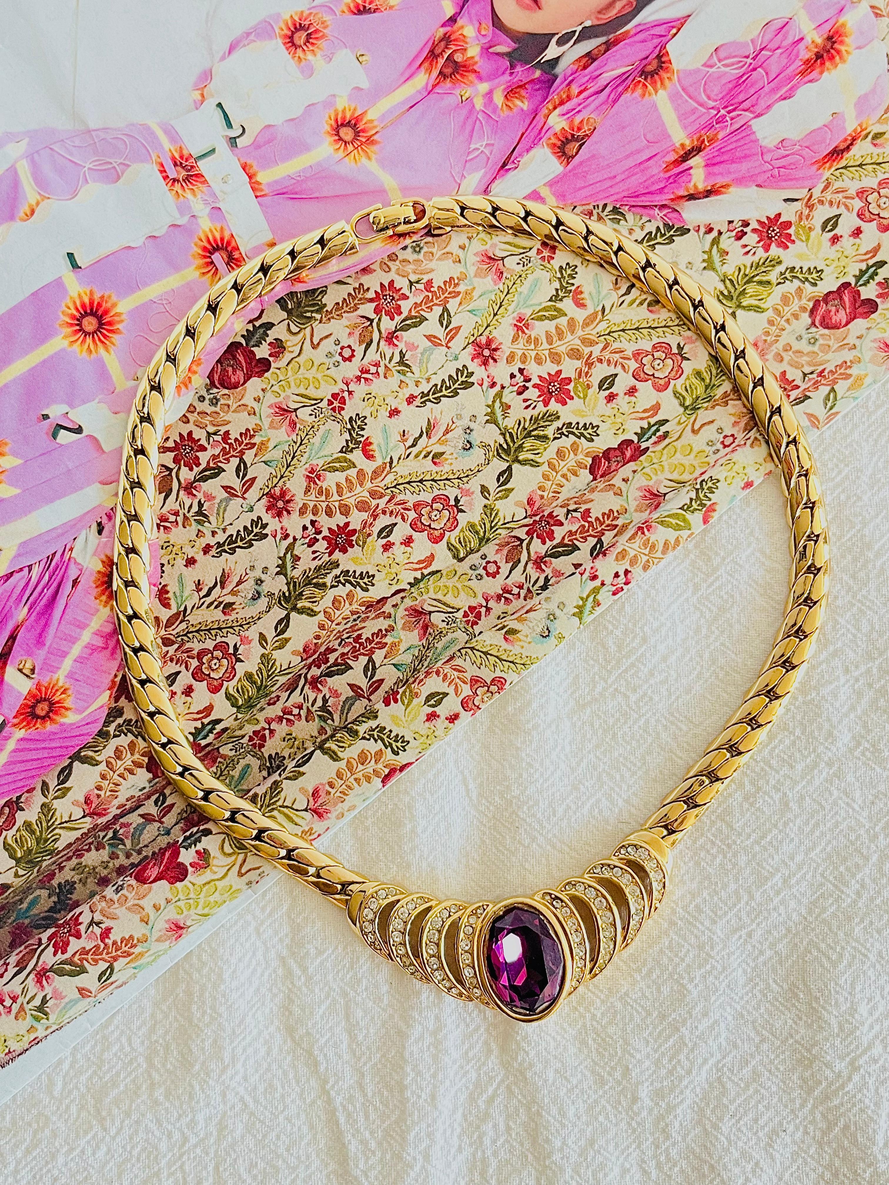 Christian Dior Vintage 1980s Large Oval Amethyst Purple Crystals Openwork Pendant Choker Necklace, Gold Tone

Very good condition. Light scratches or colour loss, barely noticeable.

Marked 'Chr.Dior (C) '. Rare to find. 100% Genuine. 

Length: 32