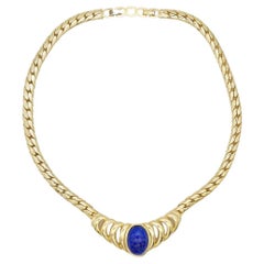 Christian Dior, collier pendentif vintage ajouré avec grand cabochon ovale bleu marine, années 1980