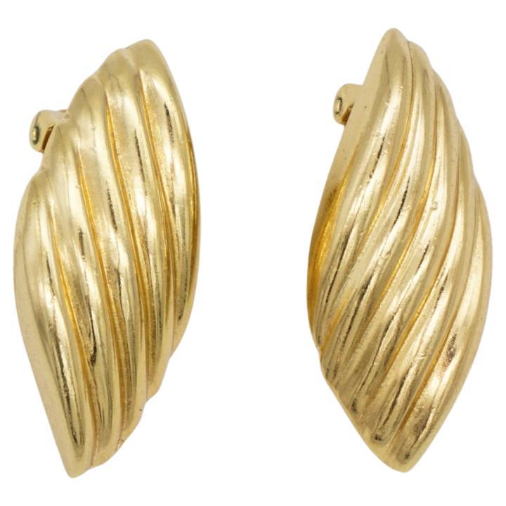Christian Dior Vintage 1980s Large Texture Shell Leaf Chunky Clip Earrings, Gold Plated

Very good condition. Maybe Light scratches or colour loss, barely noticeable. 100% Genuine.

A very beautiful pair of earrings by Chr. DIOR, signed at the