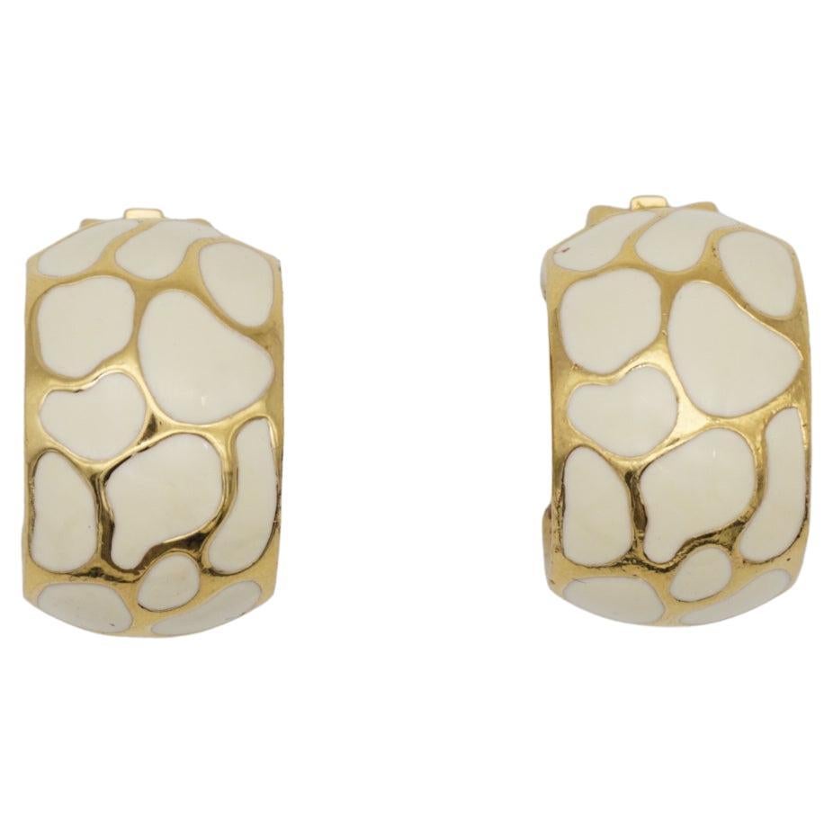 Christian Dior Vintage 1980s Unisex Textured Large White Leopard Enamel Hoop Dome Clip Earrings, Gold Tone
 
Very good condition. Front side is excellent, some spots and scratches are back. 100% Genuine. 

A very beautiful pair of earrings by Chr.