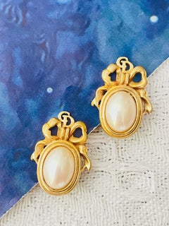 Christian Dior Vintage 1980s Logo CD Bow Tie Ribbon Oval White Pearl Earrings