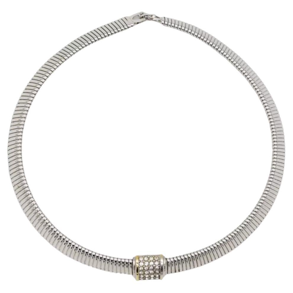 Christian Dior Vintage 1980s Omega Collar Square White Crystals Necklace, Silver Plated

Very good condition. Very new. Light scratches or colour loss one pendant, barely noticeable. 

Marked 'Chr.Dior (C) '. 100% Genuine.

This pieces dates to the